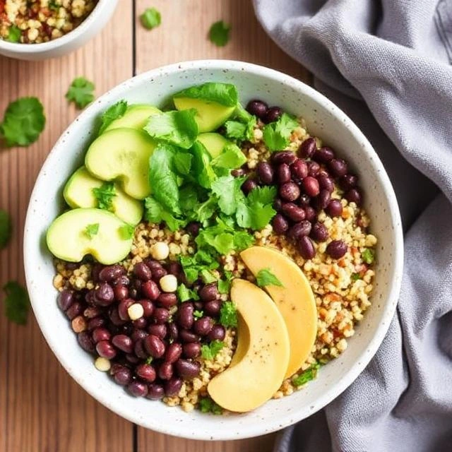 Quinoa and black bean bowl, a high-protein plant-based meal with 20g of protein.